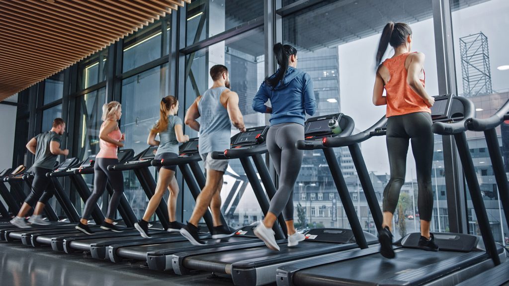 members on health club treadmills